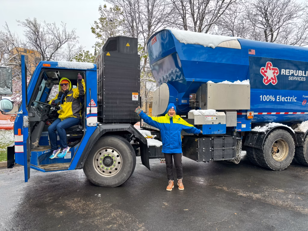 Republic Services workers with a trash truck. Republic Services is a sponsor of the Sustainable Living Association.