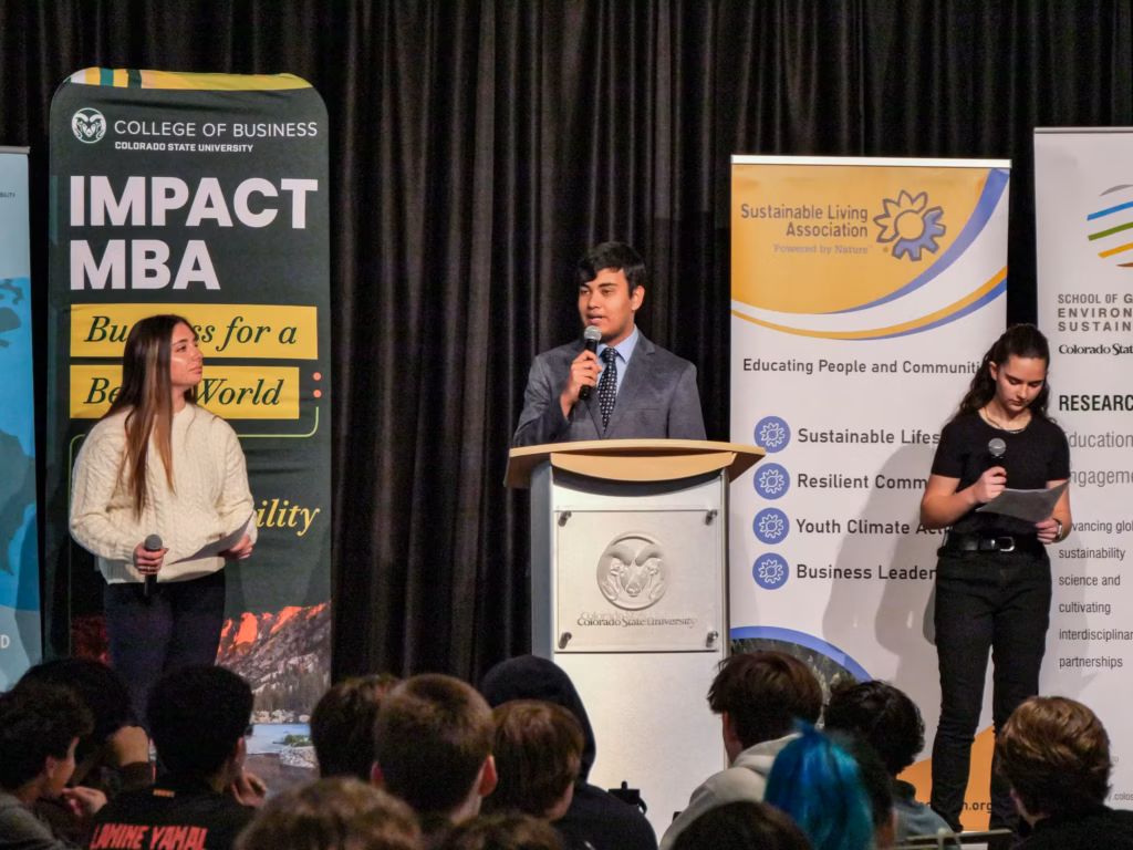 Three youth making a presentation at the Youth Climate Leadership Summit
