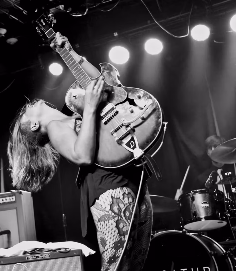 The Catcalls band with lead guitarist in the forefront